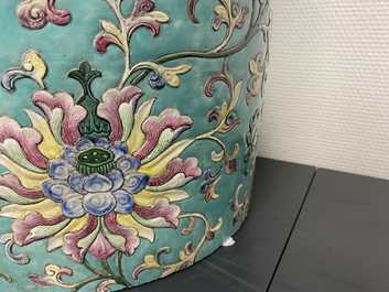 A large Chinese famille rose cylindrical vase with molded lotus scrolls, Jiaqing/Daoguang